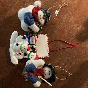 Bundle of three snowman themed ornaments.